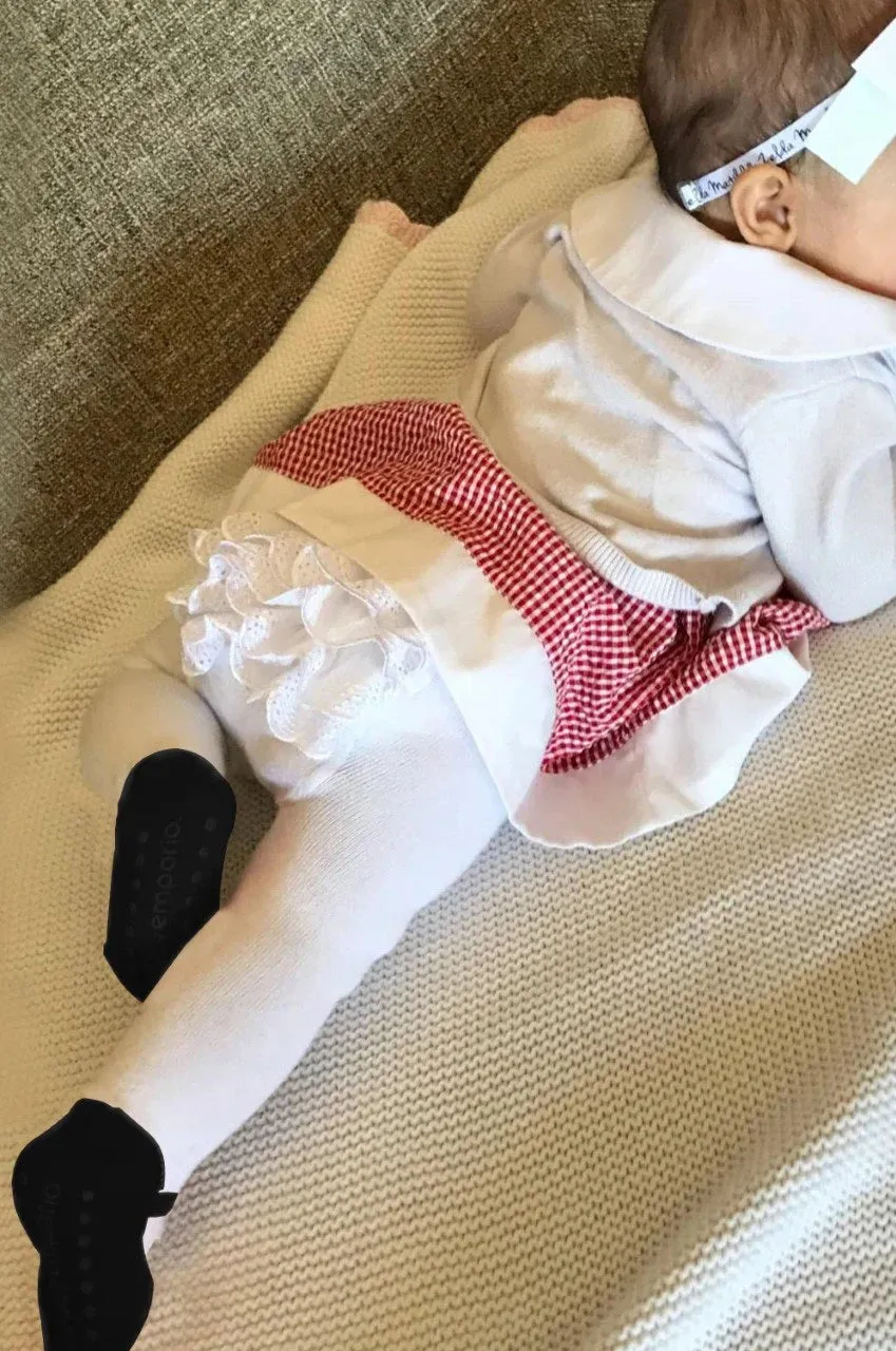 Baby girl ruffle bottom tights with sewn-in black shoe design.  Anti-slip soles. 6-12 months